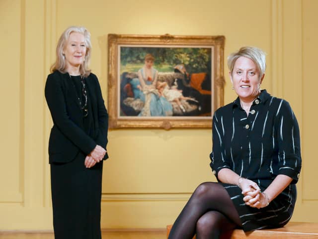 Anne Stewart, senior curator of Art at National Museums NI and Kathryn Thomson, chief executive of National Museums NI with Tissot's Quiet