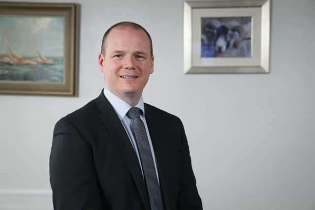 Economy Minister Gordon Lyons