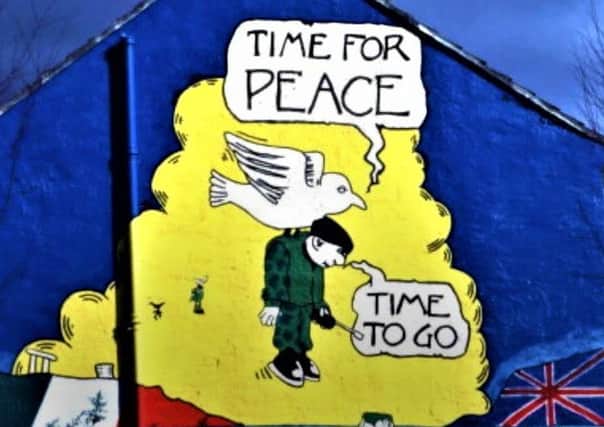 A republican mural from the time of the 1994 ceasefire (which the group broke in 1996, before re-instating it in summer 1997)