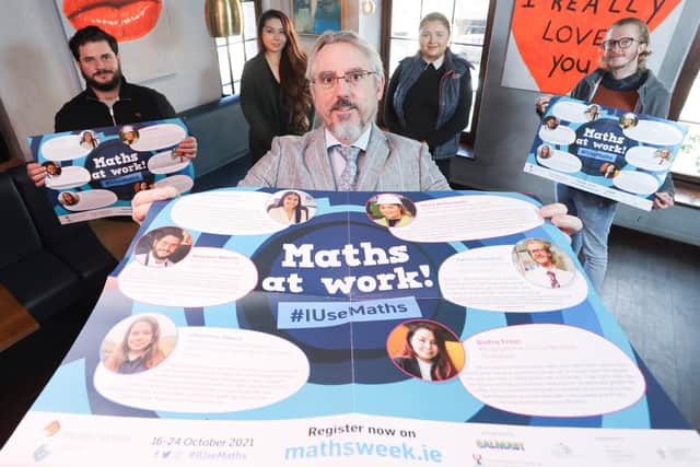 Maths Week Ireland co-founder Eoin Gill from Waterford Institute of Technology with some of the Maths Week ambassadors