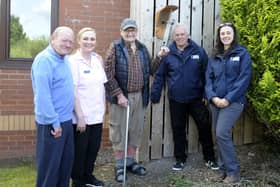 From left: Lisnisky Care Home resident Bob Richardson, Julie-Ann McStravick, personal activities leader, resident David Duprey, Peter Harper, shoreline environment officer, Lough Neagh Partnership and Ciara Laverty, Lough Neagh Partnership ranger with one of the bird feeders and cameras installed at Lisnisky Care home