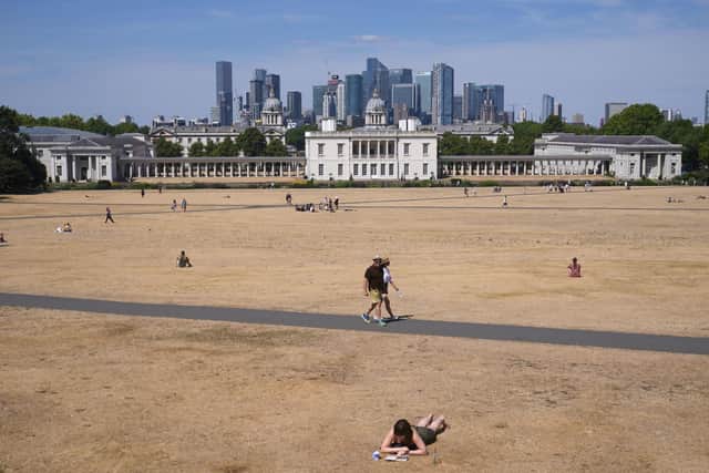 A parched Greenwich Park, London, looking back towards Queen's House. Picture date: Sunday August 7, 2022.