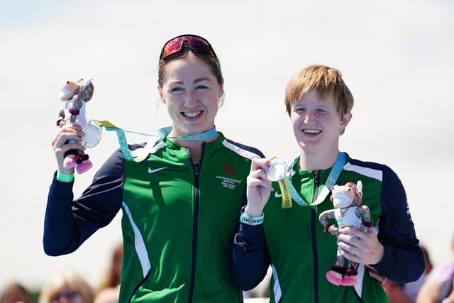 Chloe MacCombe (right) and her guide Catherine Sands celebrate winning silver in the Womens Para Triathlon on day three of the 2022 Commonwealth Games