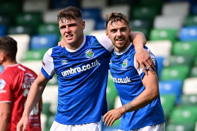 Ethan Devine celebrates scoring one of Linfield’s four goals
