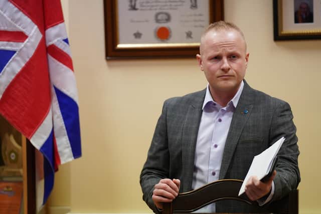 Jamie Bryson takes part in a rally against the Northern Ireland Protocol at Carlton Street Orange Hall, Portadown, in County Armagh, Northern Ireland. Picture date: Wednesday February 23, 2022.