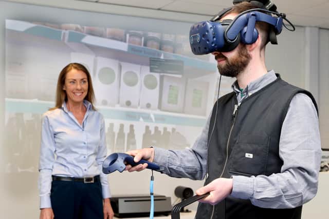 Dr Amy Burns, director of the Food and Consumer Testing Suite (FACTS) at Ulster University is pictured with Jonny Agnew, general manager, Henderson Kitchen at the new Consumer Insights Lab at the UU Coleraine Campus