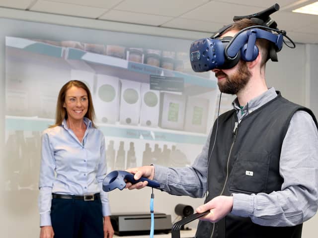 Dr Amy Burns, director of the Food and Consumer Testing Suite (FACTS) at Ulster University is pictured with Jonny Agnew, general manager, Henderson Kitchen at the new Consumer Insights Lab at the UU Coleraine Campus