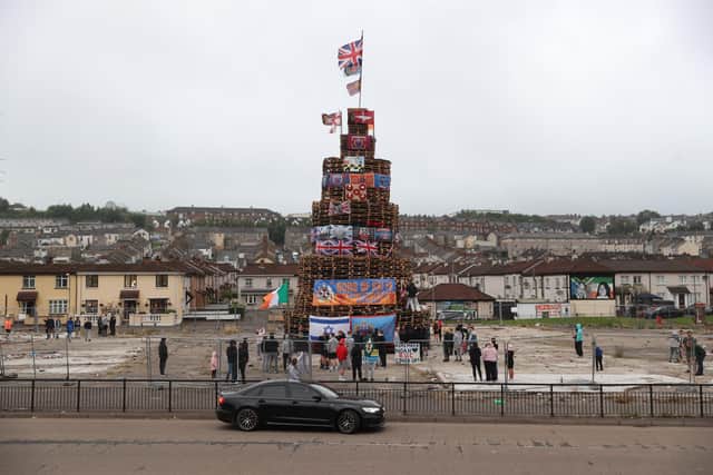 People view a bonfire prior to it being lit to mark the Catholic Feast of the Assumption in the Bogside area of Londonderry, Northern Ireland. Picture date: Monday August 15, 2022.
