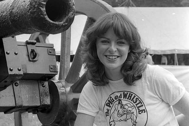 Victoria Walker from Belfast, with an older type of shooting iron than most of those which were on display at the three-day Game and Country Fair which was held at Clandeboye Estate, Bangor, in July 1982. Picture: News Letter archives