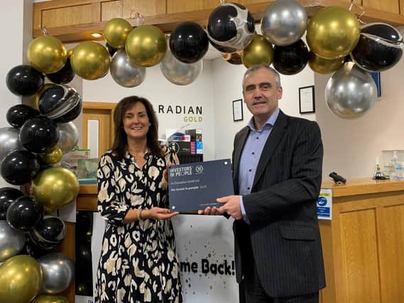 Managing director, Brian Kelly and HR manager, Angela Coney celebrating Dalradian Gold’s recent Investors in People Gold standard accreditation