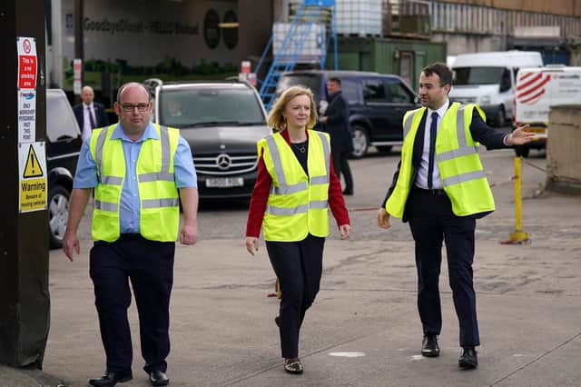 Liz Truss during a visit back in May to McCulla Haulage, in Lisburn, to discuss the Northern Ireland Protocol with businesses. The Foreign Secretary says she has heard directly from companies about the ‘reams of paperwork’ they have to complete due to the Protocol