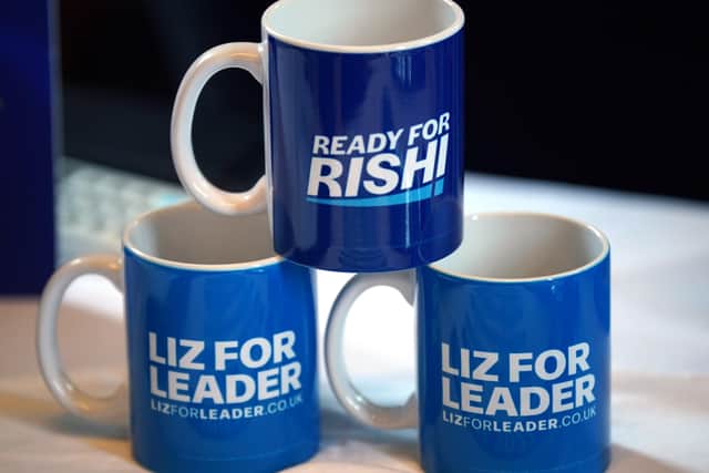 Rishi Sunak and Liz Truss branded mugs at today's hustings event at the Culloden Hotel in Belfast