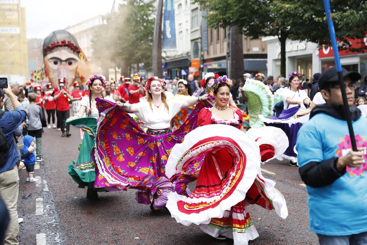 Pictures: The Mela carnival parade winds its way through Belfast city centre