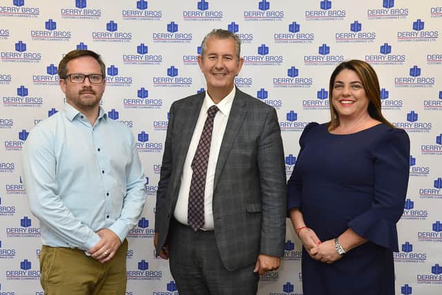 Minister Poots pictured  with Colin Robb, operations director at Derry Bros Customs Clearance Ltd and Bridget Derry, managing director of Derry Bros Shipping Ltd and Derry Bros Customs Clearance Ltd