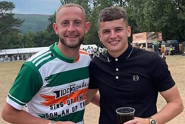 Larne FC player John Herron (left) wearing a Pro IRA t shirt on social media at with a former team mate Ronan Hale at a concert in Belfast.