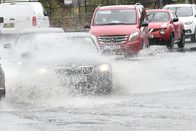 Flooded roads in Belfast earlier this year. Photo: Colm Lenaghan/Pacemaker