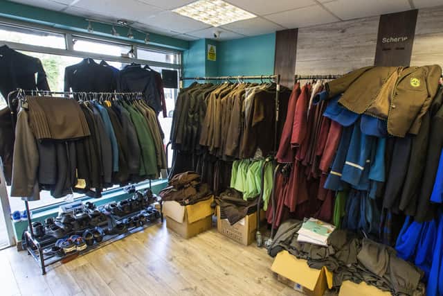 Pre-loved school uniforms at Foodstock's uniform appeal shop on the Andersonstown Road in west Belfast. PA image