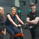 Ards Business Hub chief executive Nichola Lockhart with gym owner Jim Gordon and personal trainer Gillian Cousins