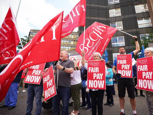 Members of health trade unions take part in a protest outside the RVH in Belfast, to demand a pay increase to help protect workers from the cost-of-living crisis.