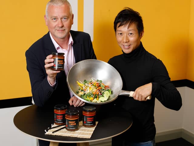 Vincent Tsang, who has created two healthy, vegan friendly and gluten-free Chinese bottled sauces with the support of Stephen Ellis, innovation manager at Innovation Factory in West Belfast