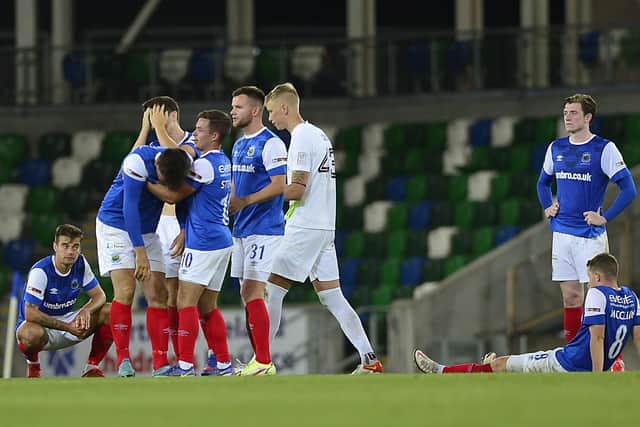 Linfield players are distraught following their penalty shootout defeat. Picture By: Arthur Allison/Pacemaker Press