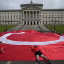 Irish language campaigners protesting outside Stormont back in May