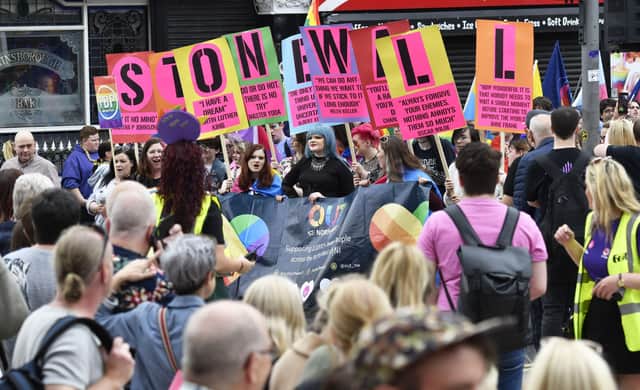 Stonewall activists at a demonstration in Londonderry’s Guildhall Square