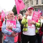 Some of the hundreds of CWU workers who gathered at Belfast City Hall in a rally highlighting their strike action over pay