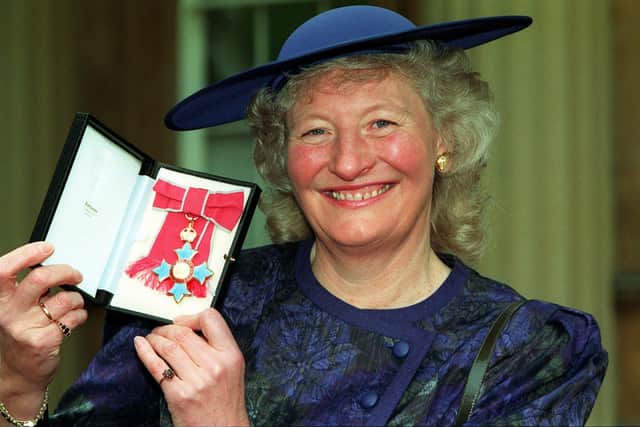 Library file dated 27/11/90 of Olympic gold medallist Mary Peters with her CBE after the Buckingham Palace investiture. PA Photos