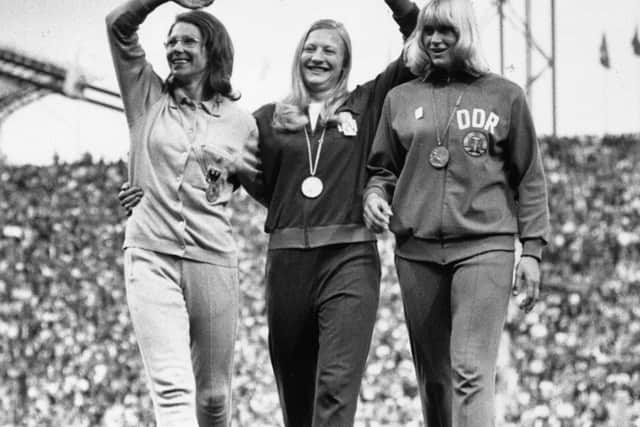 Mary Peters on the podium with Heide Rosendahl and Burglinde Pollak, both representing West Germany