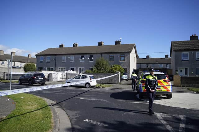 Forensic officers at the scene in the Rossfield Estate in Tallaght, Dublin