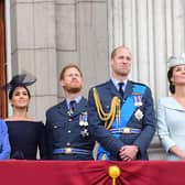 Queen Elizabeth II, Meghan, Duchess of Sussex, Prince Harry, Duke of Sussex, Prince William Duke of Cambridge and Catherine, Duchess of Cambridge