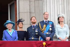 Queen Elizabeth II, Meghan, Duchess of Sussex, Prince Harry, Duke of Sussex, Prince William Duke of Cambridge and Catherine, Duchess of Cambridge