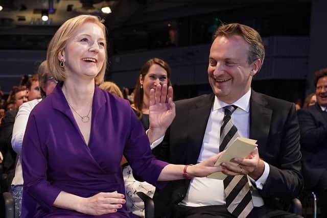 Liz Truss with her husband Hugh O'Leary, at the Queen Elizabeth II Centre in London as it was announced that she is the new Conservative party leader, and will become the next Prime Minister