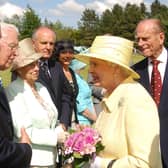The Queen pictured chatting with then Secretary of State Peter Hain and First Minister Ian Paisley during the garden party at Coleraine University in 2007 Photo by Simon Graham/Harrison Photography