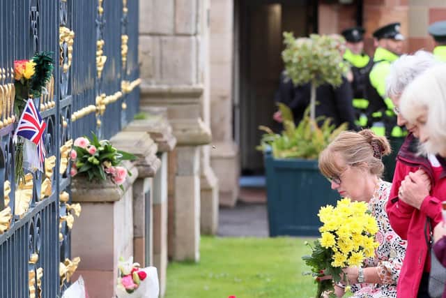 Floral tributes left at Hillsborough Castle, Co. Down, in remembrance of Queen Elizabeth II who passed away aged 96.

Picture by Jonathan Porter/PressEye