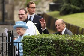 Queen Elizabeth II and the Duke of Edinburgh arrive at St. Macartin's Cathedral in Enniskillen, County Fermanagh, during a two-day visit to Northern Ireland as part of the Diamond Jubilee tour.