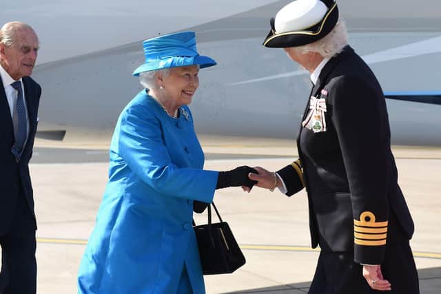 Queen Elizabeth II and Prince Philip, Duke of Edinburgh are greeted Lord Lieutenant of Belfast Mary Peters as they arrive at George Best Belfast City Airport on June 23, 2014. Photo by Marie Therese Hurson - Pool/Getty Images