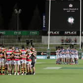 The teams hold a minutes silence to mark the death of Queen Elizabeth II before the round six Bunnings NPC match between Waikato and Auckland at FMG Stadium
