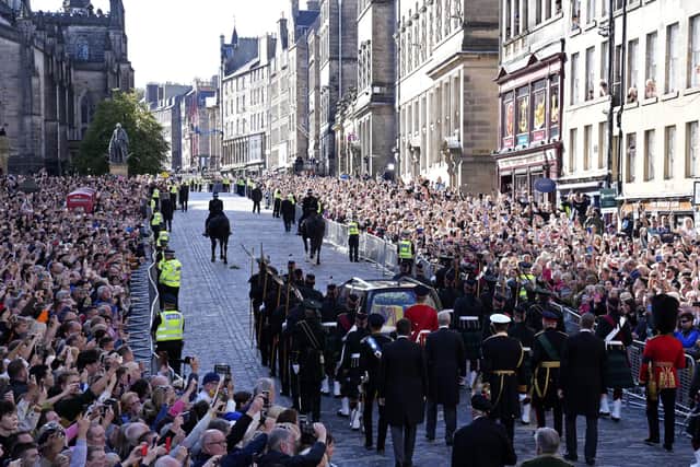 Ben Lowry writes about having been at a similar vantage point to this looking up the Royal Mile in Edinburgh after the procession of Queen Elizabeth II's coffin from the Palace of Holyroodhouse to St Giles Cathedral moved past. Photo: Jon Super/PA Wire