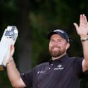 Shane Lowry lifts the trophy following the BMW PGA Championship at Wentworth Golf Club. Pic PA.