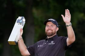 Shane Lowry lifts the trophy following the BMW PGA Championship at Wentworth Golf Club. Pic PA.
