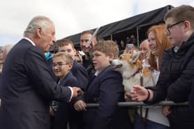 King Charles III meeting wellwishers as he arrives for a visit to Hillsborough Castle, Co Down, following the death Queen Elizabeth II on Thursday. Picture date: Tuesday September 13, 2022.