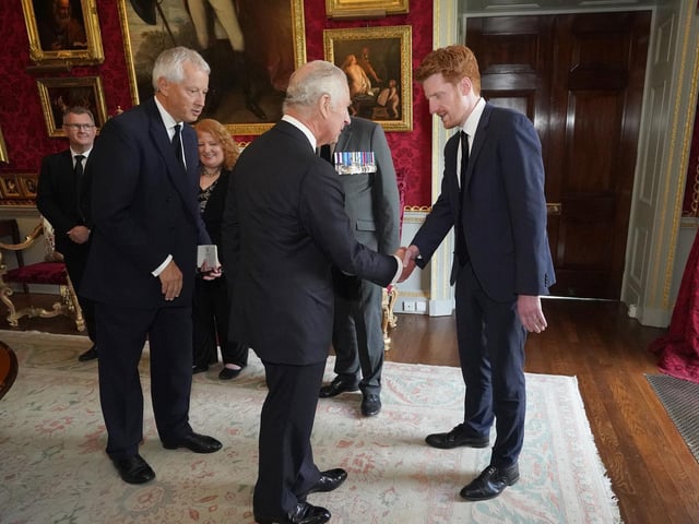 King Charles III shaking hands with SDLP MLA Matthew O'Toole at Hillsborough Castle, Co Down. Picture date: Tuesday September 13, 2022.