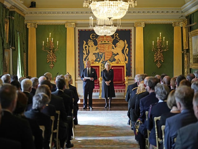 King Charles III and the Queen Consort, listening to a Message of Condolence by Alex Maskey, the Speaker of the Northern Ireland Assembly, at Hillsborough Castle, Co Down, following the death of Queen Elizabeth II on Thursday.