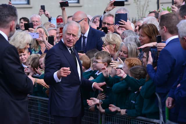 King Charles III  spent a lot of time chatting with well-wishers at Hillsborough Castle
