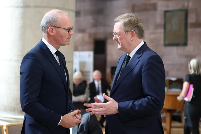 Minister for Foreign Affairs and Defence Simon Coveney (left) and Lord Caine attend a Service of Reflection for Queen Elizabeth II at St Anne's Cathedral in Belfast.