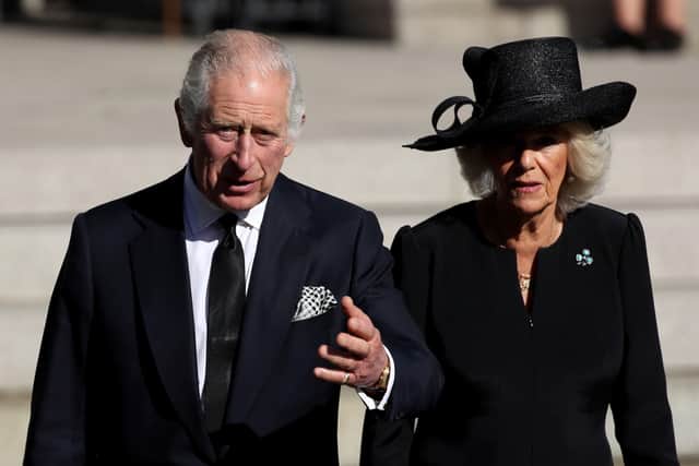 King Charles III and Queen Consort leaving St Anne's Cathedral