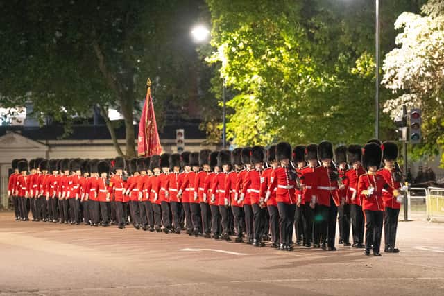 An early morning rehearsal for the procession of Queen Elizabeth's coffin from Buckingham Palace to Westmister Hall, London, where it will lie in state until her funeral on Monday. Picture date: Tuesday September 13, 2022.