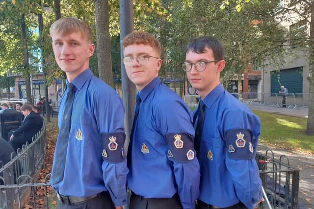 Andrew Greer, James Taylor and Neil McKay from 1st Cookstown Boys Brigade proudly display their Queen's Badges